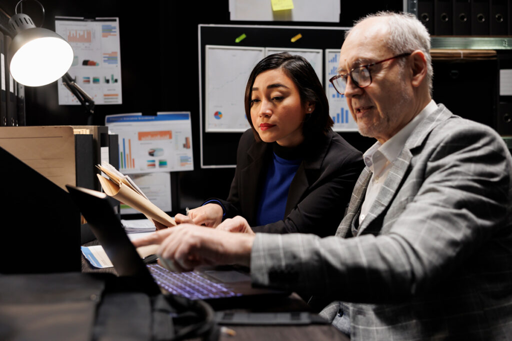 business executives comparing data 2025 02 19 00 22 01 utc